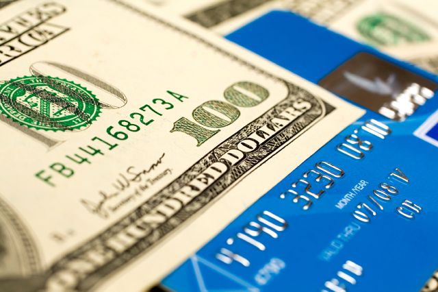 credit card and dollar close-up